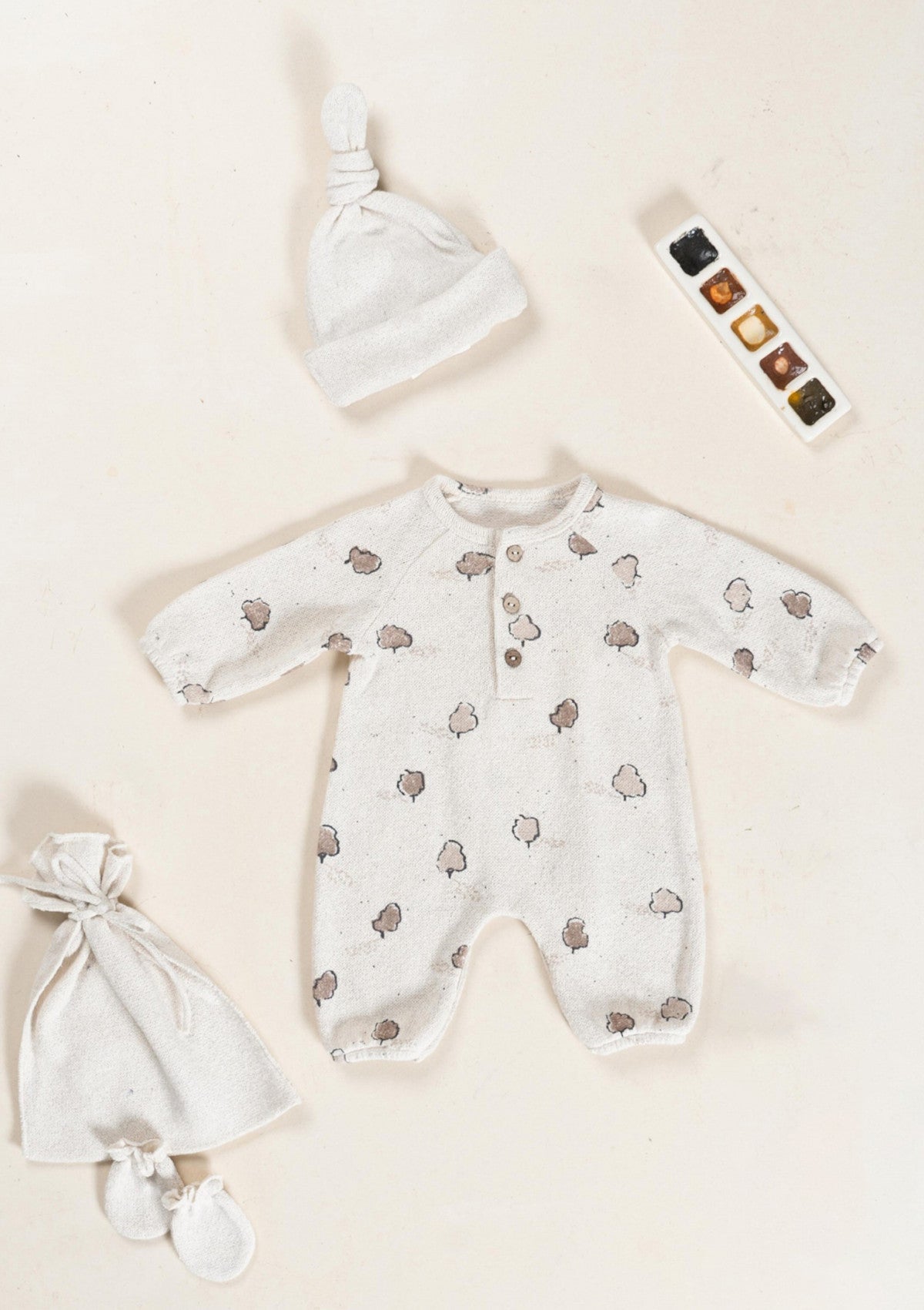 Knitted jumpsuit with front opening and tree print - PLAYUP